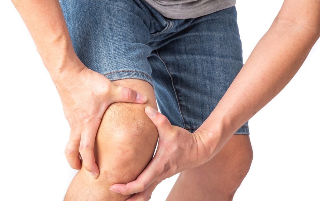 Joint injuries, Area of the injury, the image on a clean background. spasm on the man's knee.
